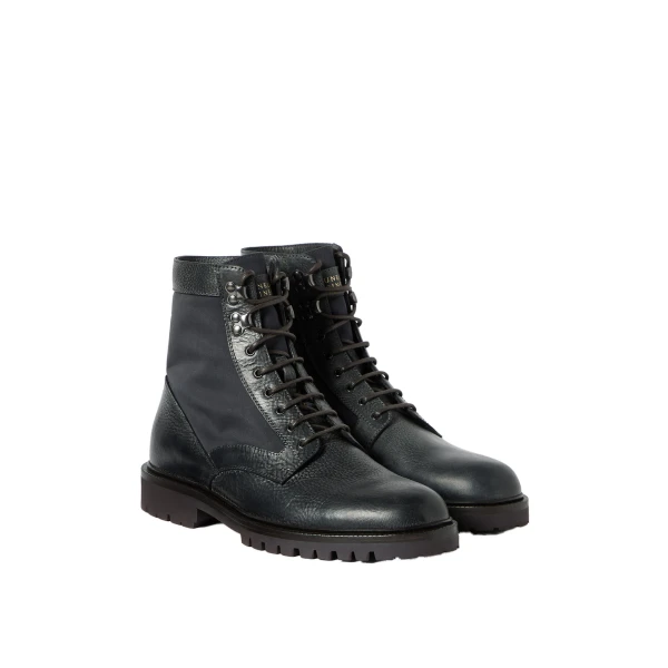 Aged calfskin and waxed nylon boots in Black