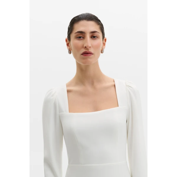 By Malina Carmen Gown in Ivory | Wedding Dresses | Coveti