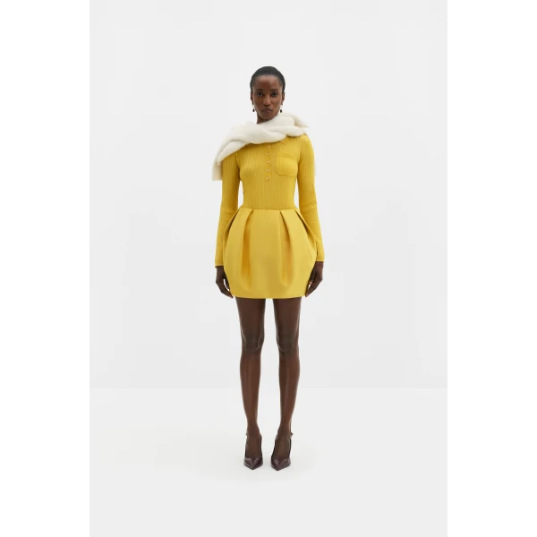 By Malina Ellis Mini Skirt in Mango | Mini Skirts | Coveti