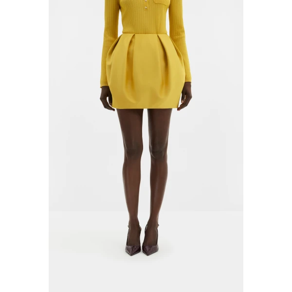 By Malina Ellis Mini Skirt in Mango | Mini Skirts | Coveti
