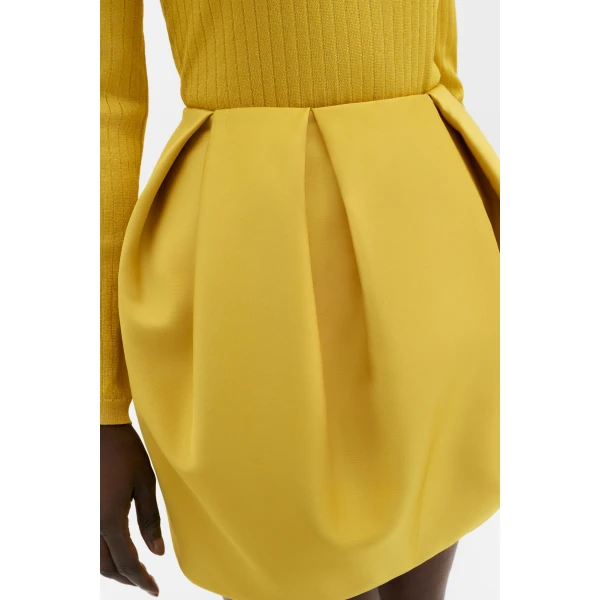 By Malina Ellis Mini Skirt in Mango | Mini Skirts | Coveti