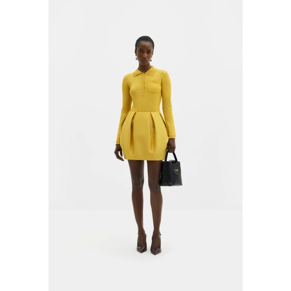 By Malina Ellis Mini Skirt in Mango | Mini Skirts | Coveti