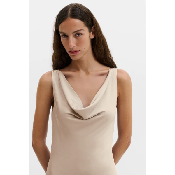 By Malina Leah Maxi Dress in Champagne | Maxi Dresses | Coveti