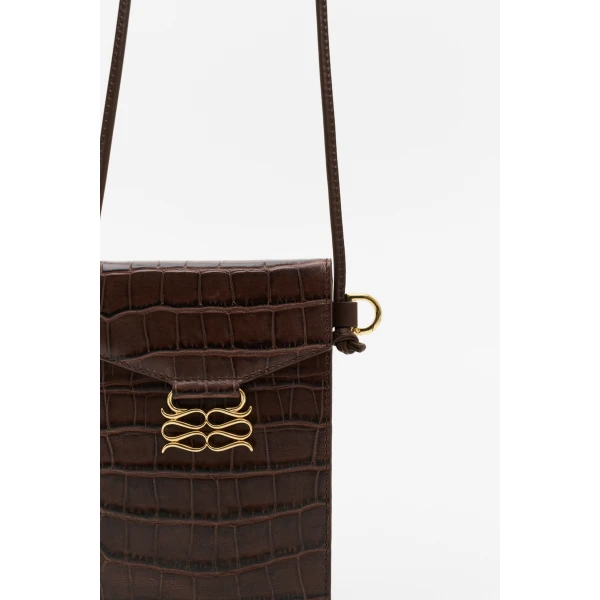 By Malina Monogram Leather Phone Pouch in Dark Brown Croco | Phone Cases | Coveti