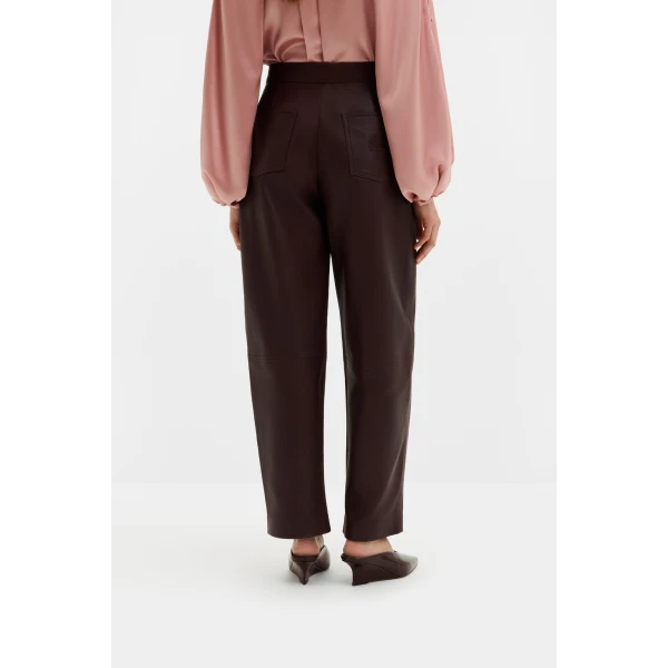 By Malina Paige Leather Trousers in Burgundy | Pants | Coveti