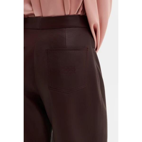 By Malina Paige Leather Trousers in Burgundy | Pants | Coveti