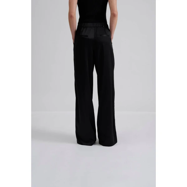 By Malina Sarah Trousers in Black | Pants | Coveti