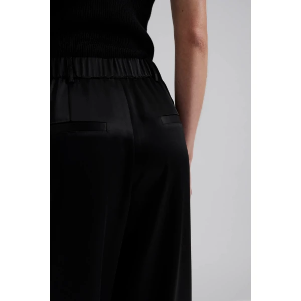 By Malina Sarah Trousers in Black | Pants | Coveti
