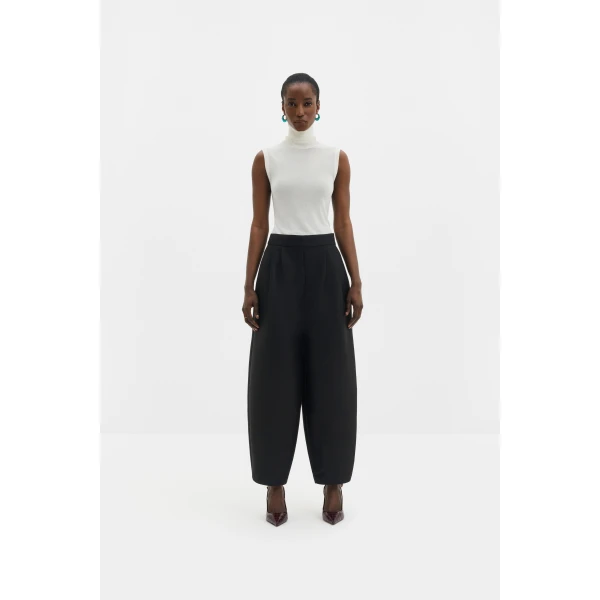 By Malina Smilla Trousers in Black | Pants | Coveti