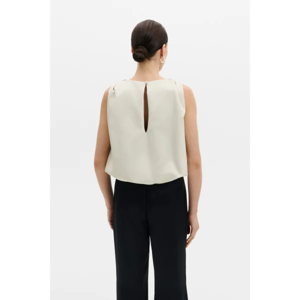 By Malina Valentina Top in Pearl | Tops | Coveti