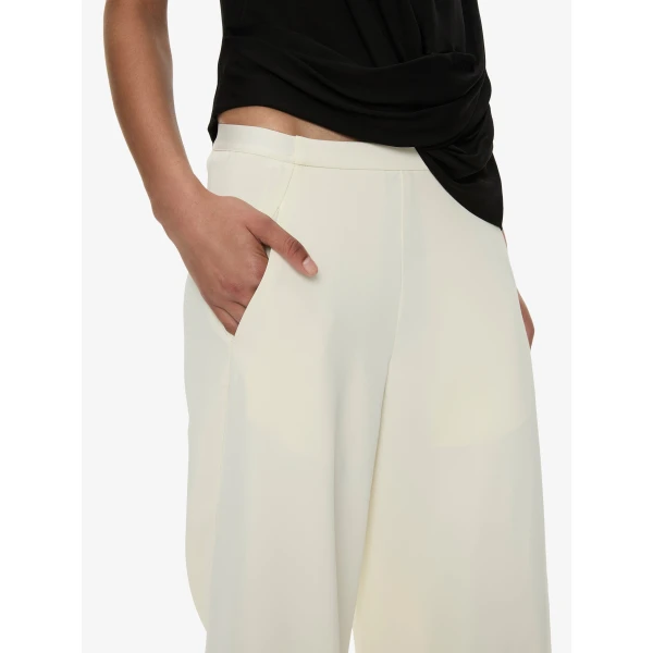 Christopher Esber Bias Crepe Trouser in Cream | Pants | Coveti