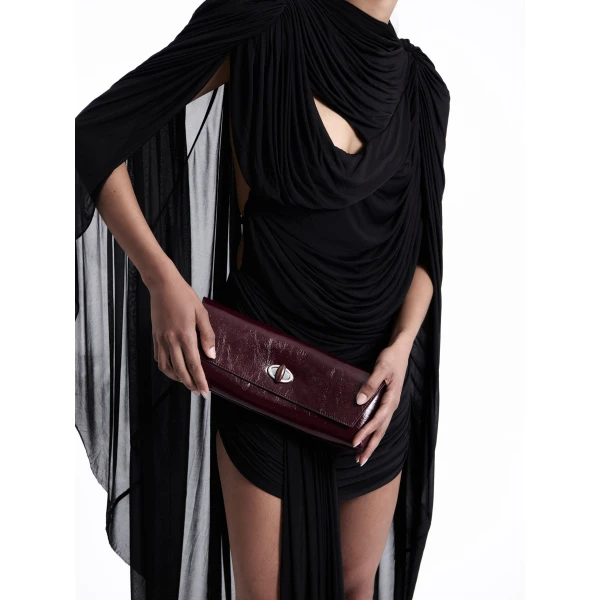 Christopher Esber Buki Patent Clutch in Barolo | Clutch Bags | Coveti