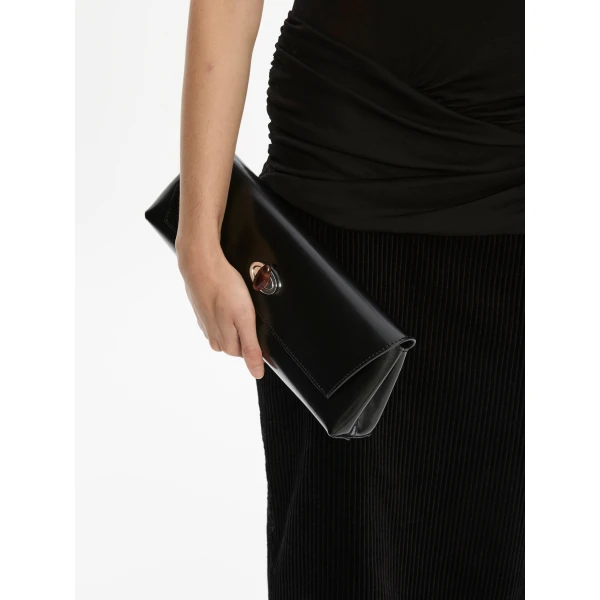 Christopher Esber Buki Polished Clutch in Black | Clutch Bags | Coveti