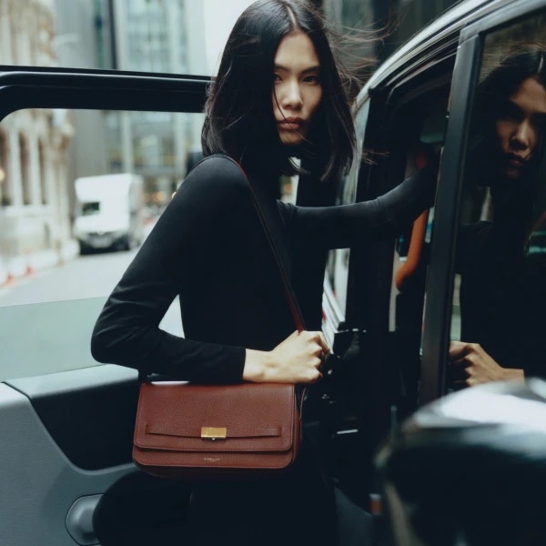 DeMellier The New York Crossbody in Warm Brown Small Grain Crossbody Bag, view 2 | Shoulder & Crossbody Bags | Coveti