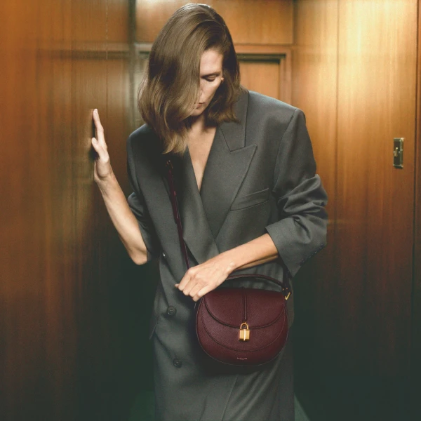 DeMellier The Siena Saddle in Burgundy Small Grain Crossbody Bag, view 2 | Shoulder & Crossbody Bags | Coveti