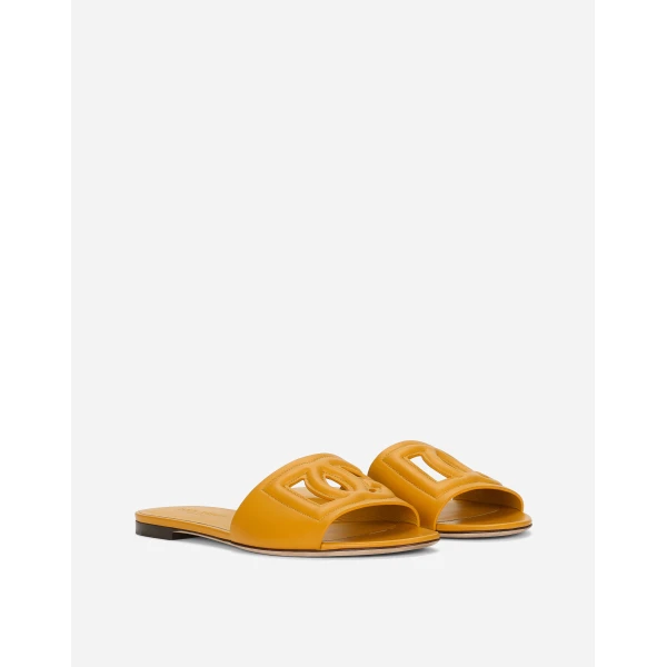 Yellow Dolce & Gabbana Calfskin slides with DG logo, view 3 | Flip Flops & Slides