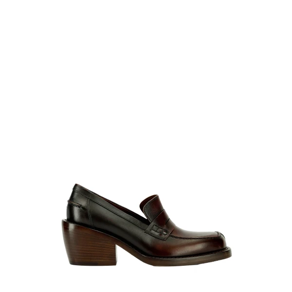 Heeled leather loafers in Tan