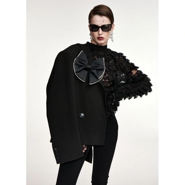 Essentiel Antwerp Black rhinestone-trimmed bow brooch | Brooches & Pins | Coveti