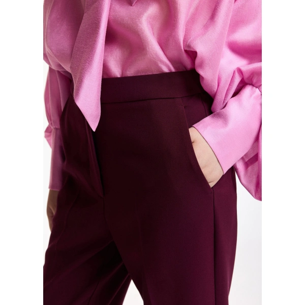 Essentiel Antwerp Burgundy trumpet-shaped tailored pants | Tailored Pants | Coveti