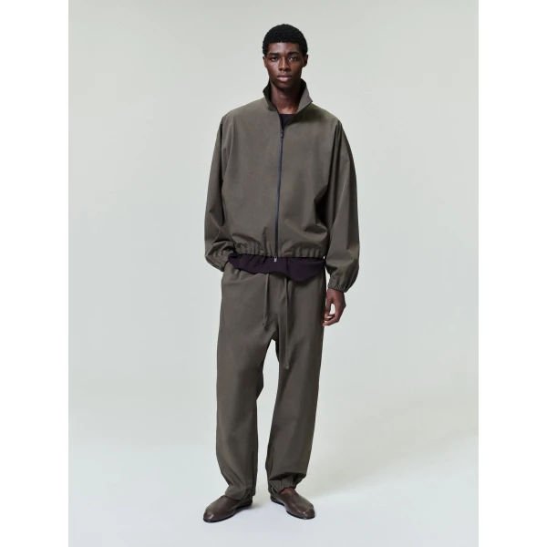 Fear of God Bonded Nylon Tech Track Jacket in Forest | Men Jackets | Coveti