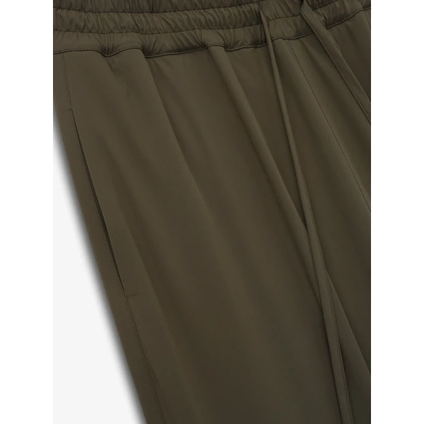 Fear of God Bonded Nylon Tech Track Pants in Forest | Pants | Coveti