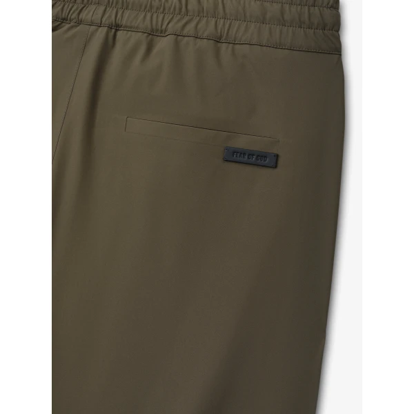 Fear of God Bonded Nylon Tech Track Pants in Forest | Pants | Coveti