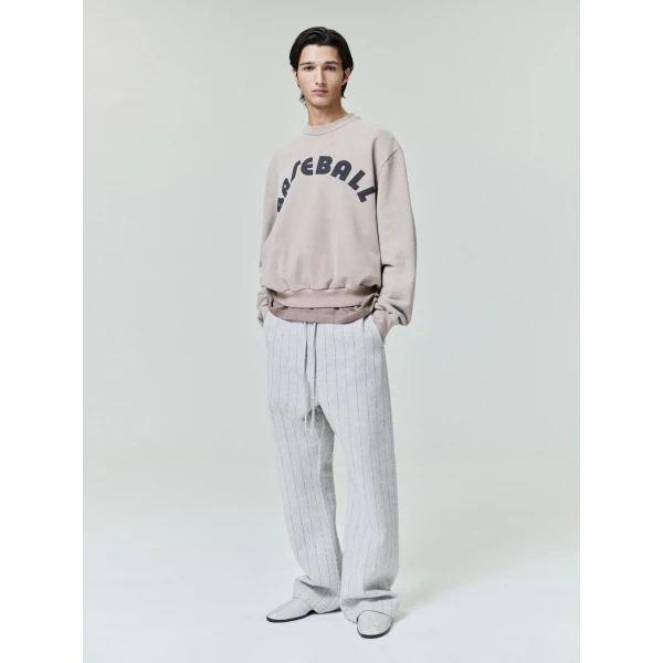 Fear of God Double Face Wool Baseball Flared Pants in Light Beige and Black | Pants | Coveti