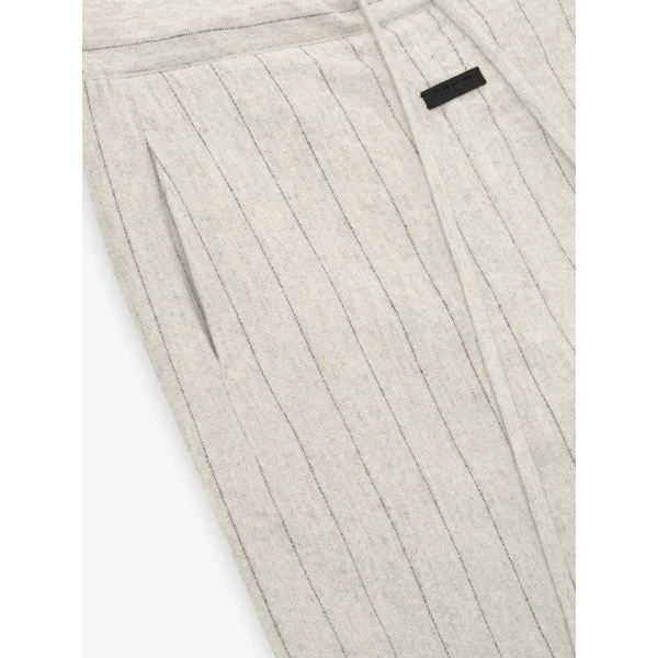 Fear of God Double Face Wool Baseball Flared Pants in Light Beige and Black | Pants | Coveti