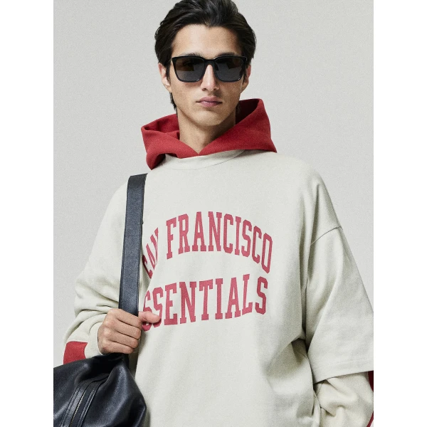 Fear of God Essentials 49ers Merch Tee in Sandstone | T-shirts & vests | Coveti