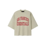 Fear of God Essentials 49ers Merch Tee in Sandstone | Coveti