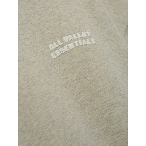 Fear of God Essentials 90s Sweatshirt in Washed Vanilla Heather | Sweatshirts | Coveti