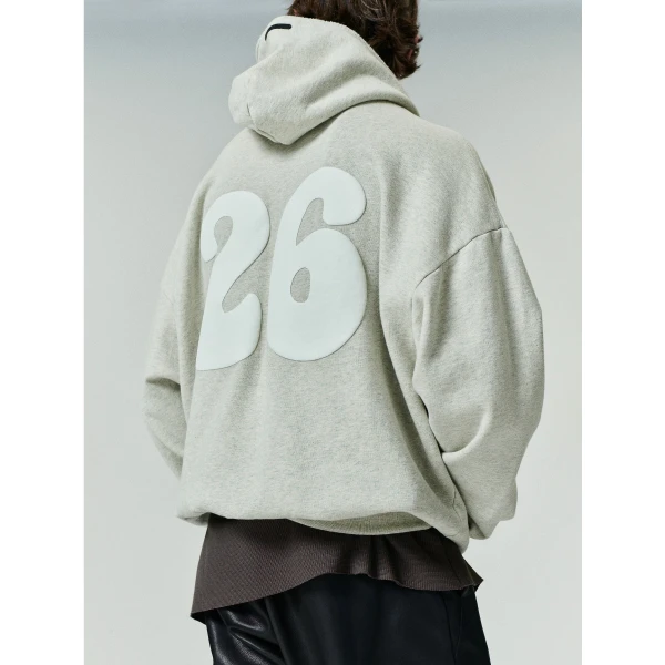 Fear of God Essentials 90s Zip-Up Hoodie in Washed Vanilla Heather | Sweatshirts | Coveti
