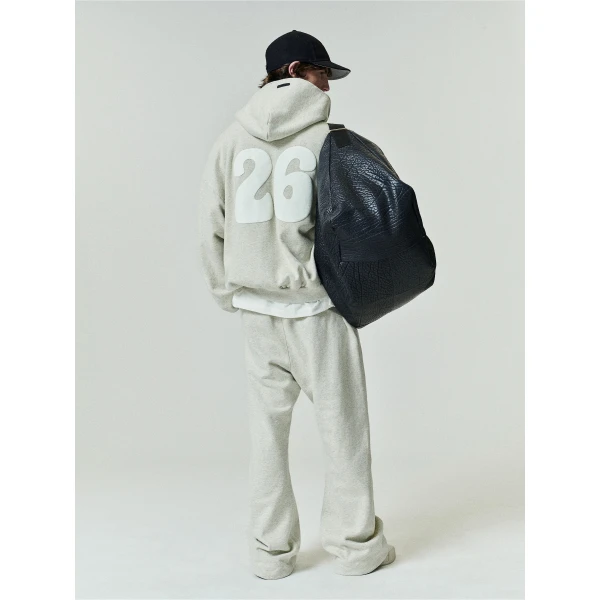 Fear of God Essentials 90s Zip-Up Hoodie in Washed Vanilla Heather | Sweatshirts | Coveti