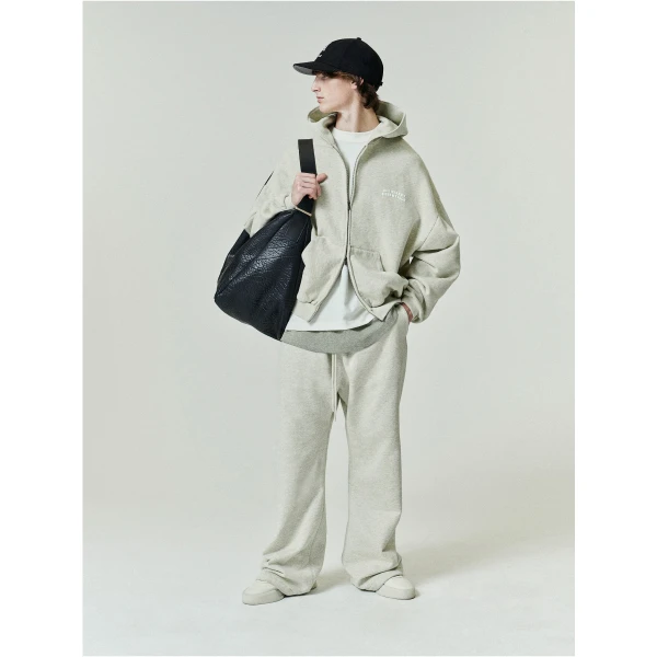 Fear of God Essentials 90s Zip-Up Hoodie in Washed Vanilla Heather | Sweatshirts | Coveti