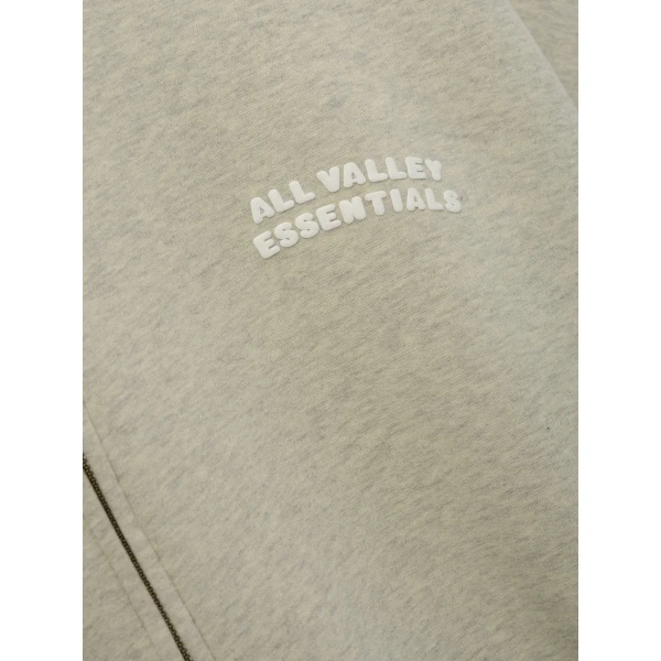 Fear of God Essentials 90s Zip-Up Hoodie in Washed Vanilla Heather | Sweatshirts | Coveti