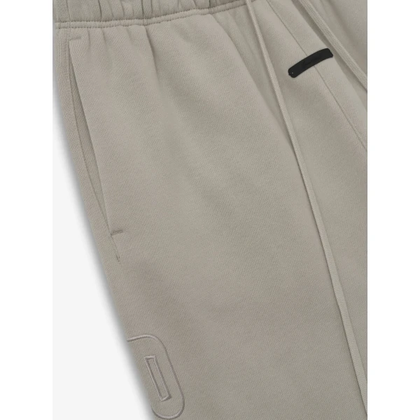 Fear of God Essentials Active Trace Relaxed Sweatpant in Seal | Pants | Coveti