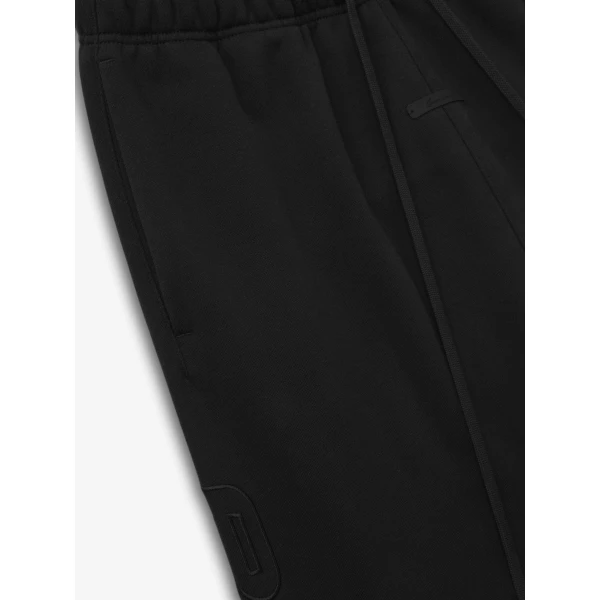 Fear of God Essentials Active Trace Relaxed Sweatpant in Vintage Black | Pants | Coveti