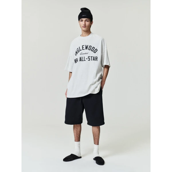 Fear of God Essentials Active Trace Relaxed Sweatshort in Vintage Black | Shorts | Coveti