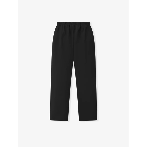 Fear of God Essentials Bonded Nylon Signature Classic Track Pant in Black | Pants | Coveti