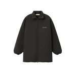 Fear of God Essentials Bonded Nylon Signature Filled Barn Jacket in Ink Black | Coveti