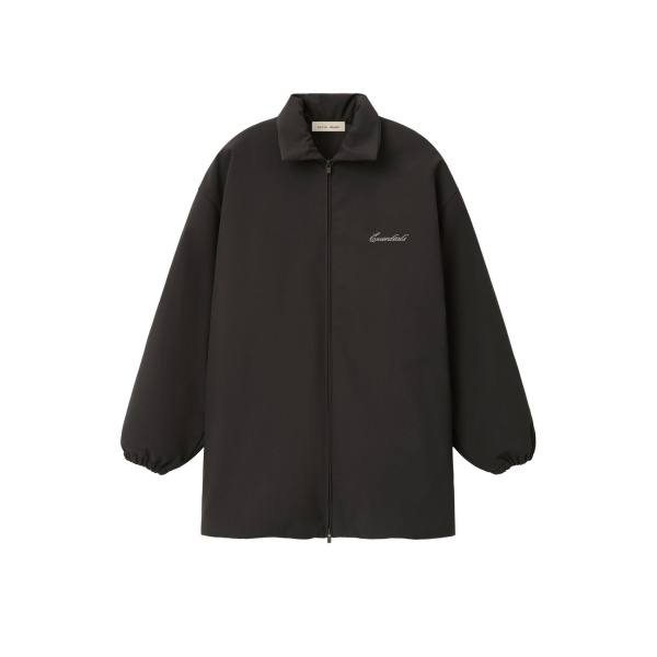 Fear of God Essentials Bonded Nylon Signature Filled Barn Jacket in Ink Black | Coveti