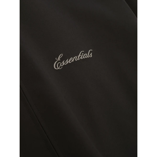 Fear of God Essentials Bonded Nylon Signature Full Zip Track Jacket in Ink Black | Men Jackets | Coveti
