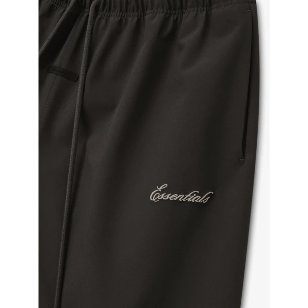 Fear of God Essentials Bonded Nylon Signature Relaxed Short with Slit in Ink Black | Shorts | Coveti