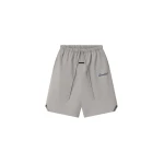 Fear of God Essentials Bonded Nylon Signature Relaxed Short with Slit in Stone | Coveti