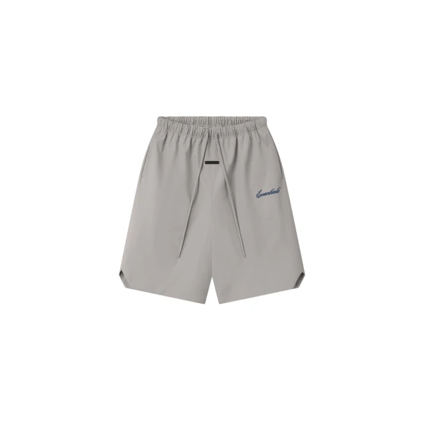 Fear of God Essentials Bonded Nylon Signature Relaxed Short with Slit in Stone | Coveti