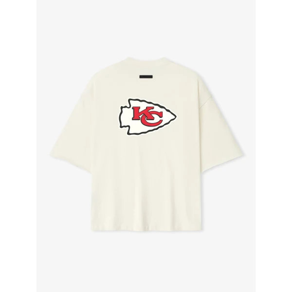 Fear of God Essentials Chiefs 90s 3/4 Sleeve Football Tee in Cream White | T-shirts & vests | Coveti