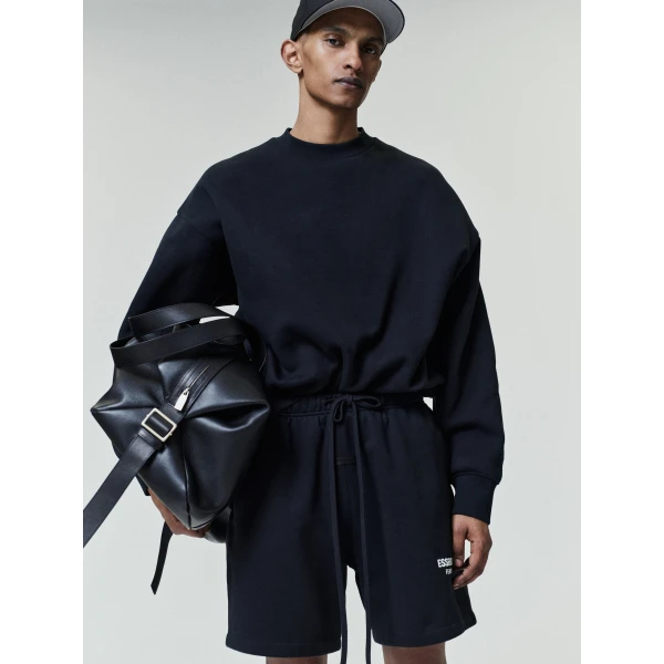 Fear of God Essentials Classic Crewneck Sweatshirt in Vintage Black | Sweatshirts | Coveti