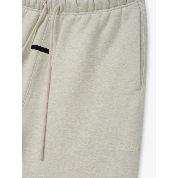 Fear of God Essentials Classic Fleece Sweatpant in Vanilla Heather | Pants | Coveti