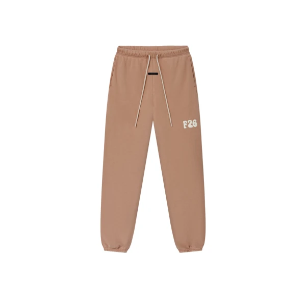 Fear of God Essentials Classic Fleece Sweatpant in Washed Ginger | Coveti