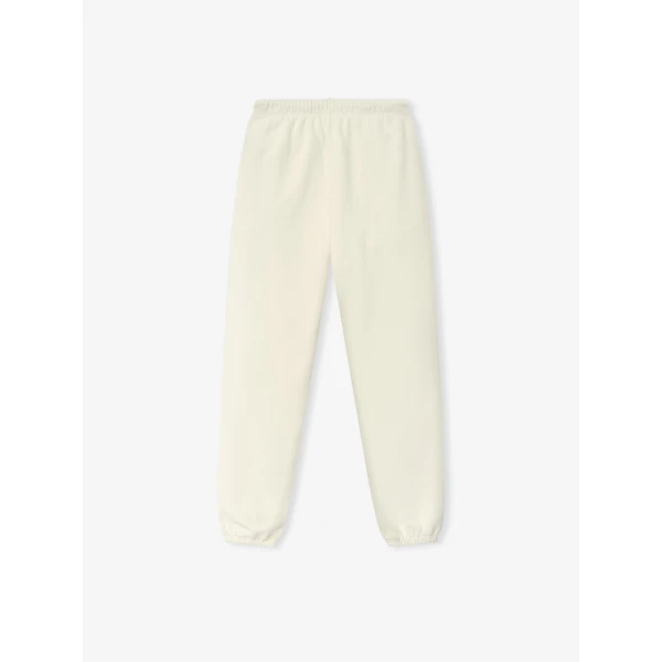Fear of God Essentials Classic Fleece Sweatpant in Washed Ivory | Pants | Coveti